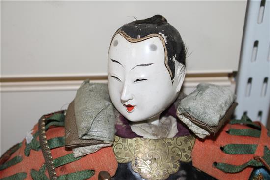 A collection of Japanese lacquered and composition head Gosha dolls, including three Musha Samurai, c.1900-1920